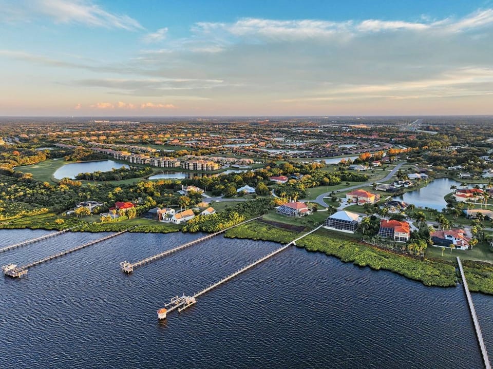 Golden hour aerial of bayfront docks