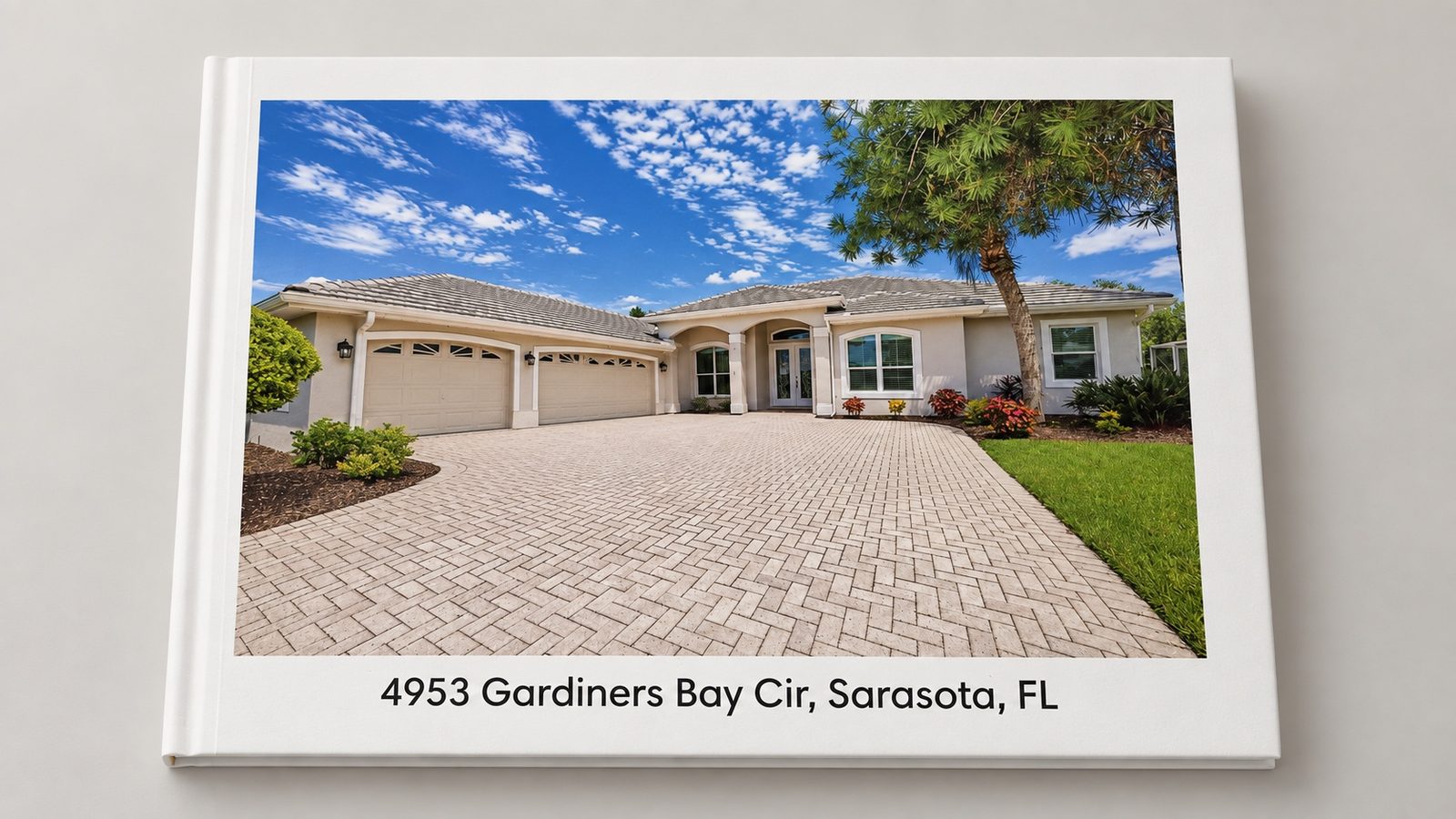 Custom hardcover photo book cover with a listing home